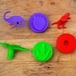 Sellos de huellas y siluetas de dinosaurios