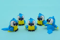 Mini guacamayo azul articulado en 3D